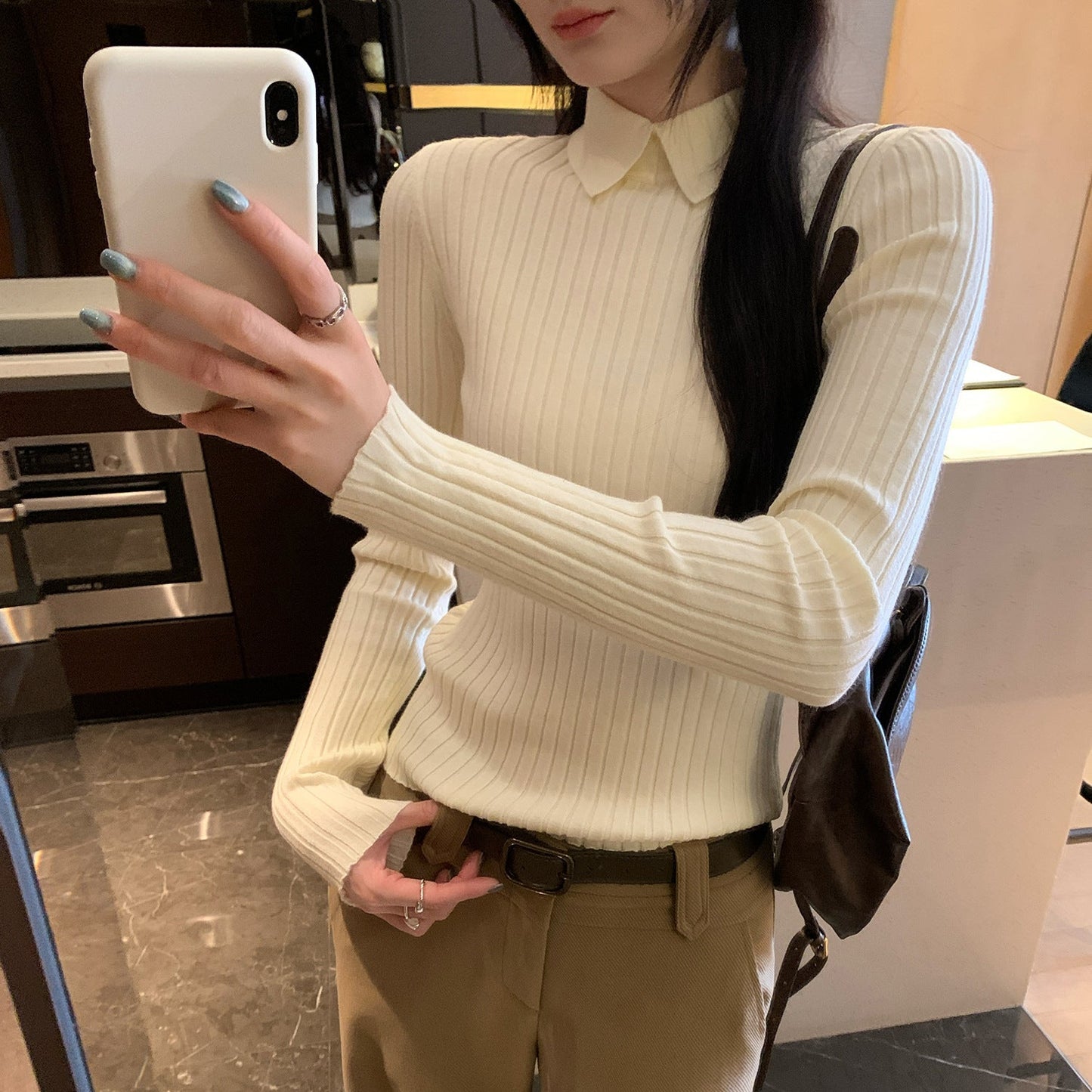 Lady-fitting innerwear apricot knit top with a stand-up collar design
